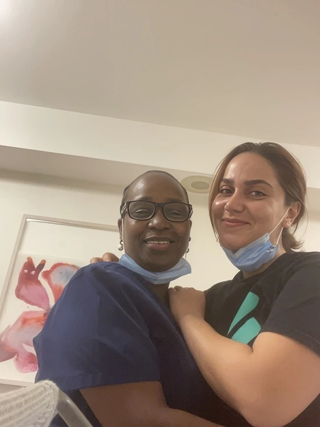 Immigrant nurse Azam with a coworker in Montreal – building cross-cultural bonds in Canadian healthcare